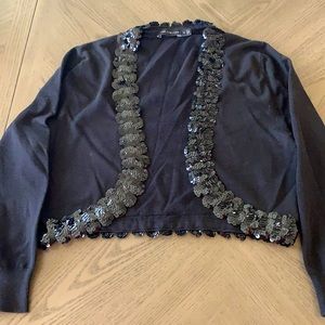 Limited black shrug